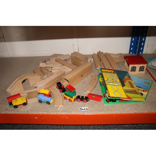 330 - Vintage Brio wooden railway set comprising track, a bridge, buildings, etc.