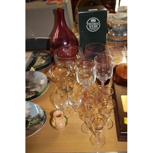 305 - Glassware to include Cranberry glass vase, Thomas Webb boxed decanter, etc.