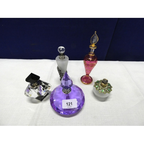 121 - Five modern cut glass perfume bottles.