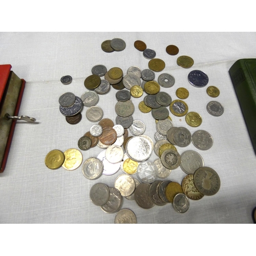 149 - Two vintage savings bank books and world coins.