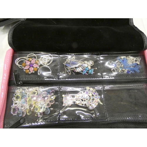 151 - Box of costume jewellery to include silver.