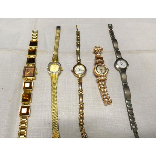 146 - Five ladies fashion watches.