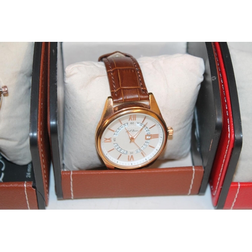 526 - Three L A Banus gents wristwatches, boxed.