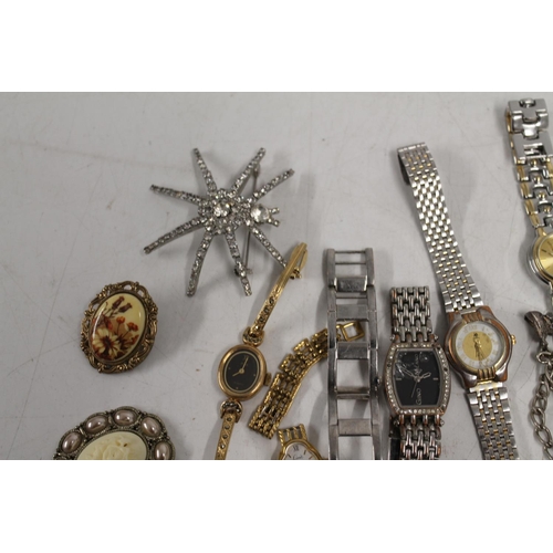 528 - Selection of ladies dress watches, costume jewellery and two commemorative crowns.