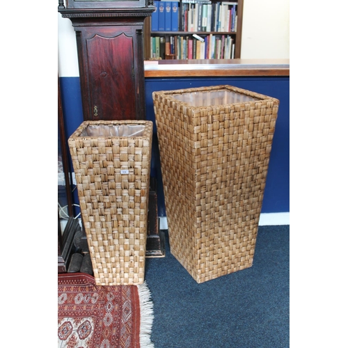 636 - Two graduated large wicker baskets