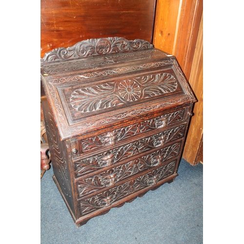 642 - Victorian carved oak bureau