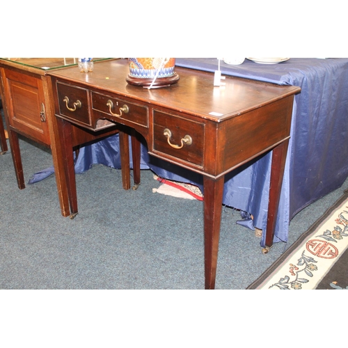 666 - Victorian oak lowboy on brass castors