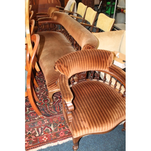 681 - Late Victorian parlour suite of a three seater sofa and pair of matching armchairs.