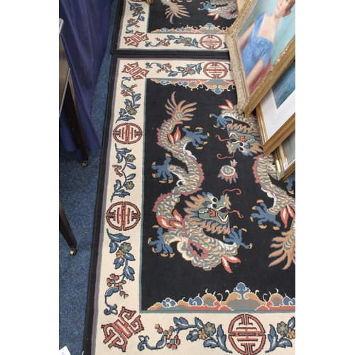 687 - Pair of Chinese wash wool rugs, 166cm x 120cm.