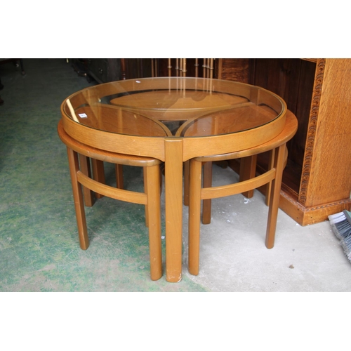 559 - Mid-century teak coffee table with a nest of tables underneath by Nathan.