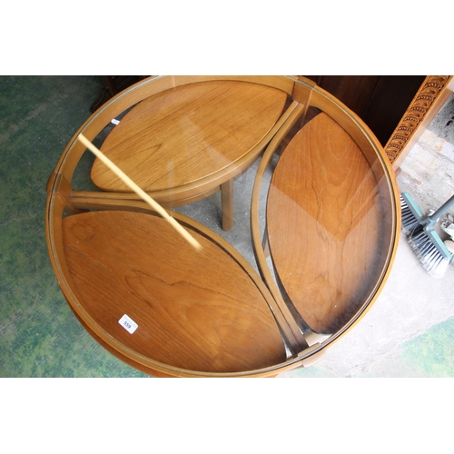 559 - Mid-century teak coffee table with a nest of tables underneath by Nathan.