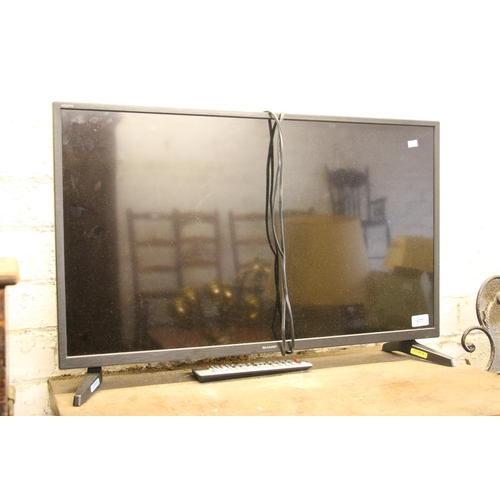 577 - Sharp flatscreen television, 31