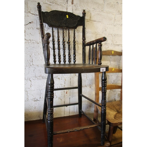 593 - Late 19th century spindle back highchair, 95cm high.