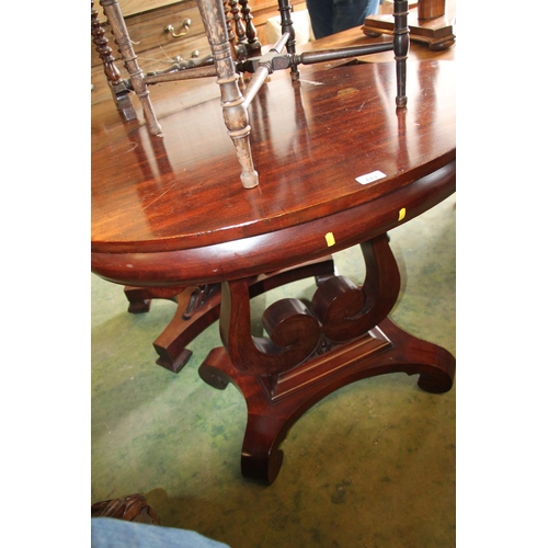 613 - Late Victorian mahogany oval topped centre table, 77cm high.