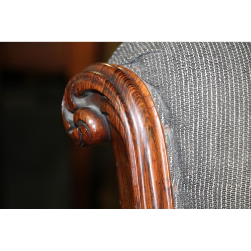 614 - Rosewood framed button back armchair.