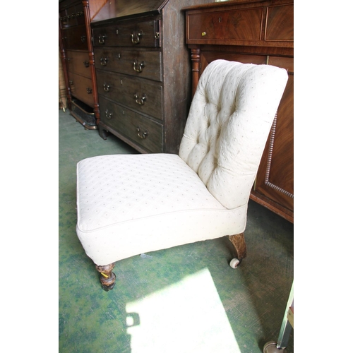 627A - Late Victorian button back nursing chair.