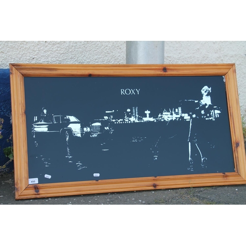 495 - Mirror depicting a Roxy Music album cover, 44cm x 90cm in pine frame 55cm x 100cm.