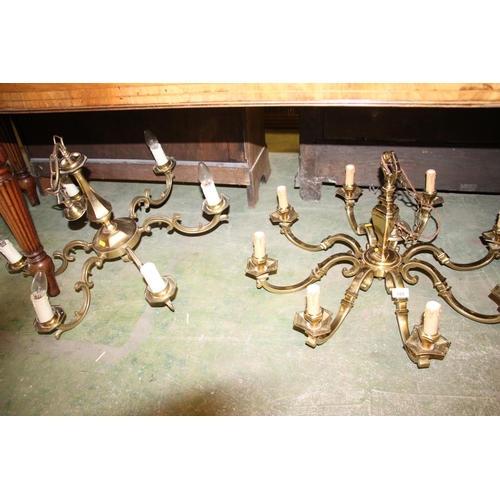 625 - Two brass chandeliers.