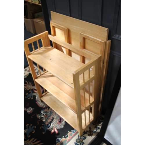 669 - Two folding pine shelves