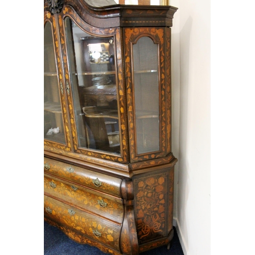 1000 - Dutch walnut bombe display cabinet, 19th century, the swan neck pediment with central belted acanthu... 