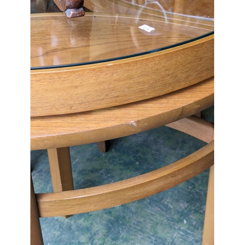 559 - Mid-century teak coffee table with a nest of tables underneath by Nathan.