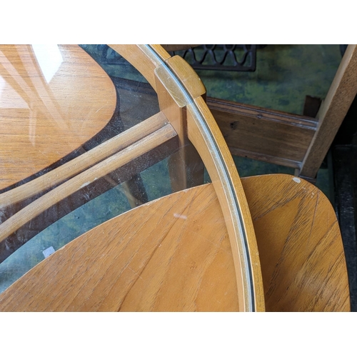 559 - Mid-century teak coffee table with a nest of tables underneath by Nathan.