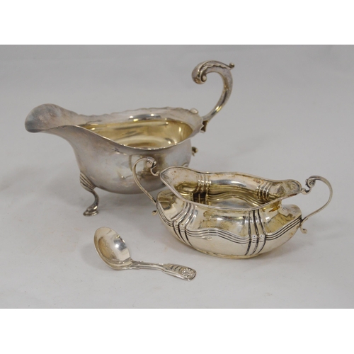 43 - Silver sauce boat, Chester 1923, a silver sugar basin and a silver caddy spoon, by George Unite, Bir... 