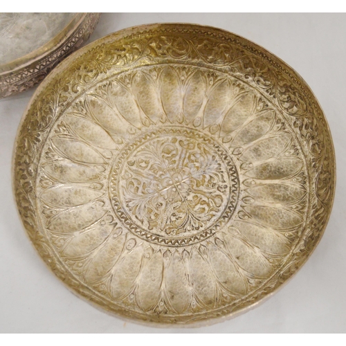 44 - Various items of Indian export embossed wares, mainly bowls, some silver, and a silver export card c... 