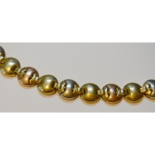 138 - 9ct coloured gold bracelet with hinged button links, 17.4g.