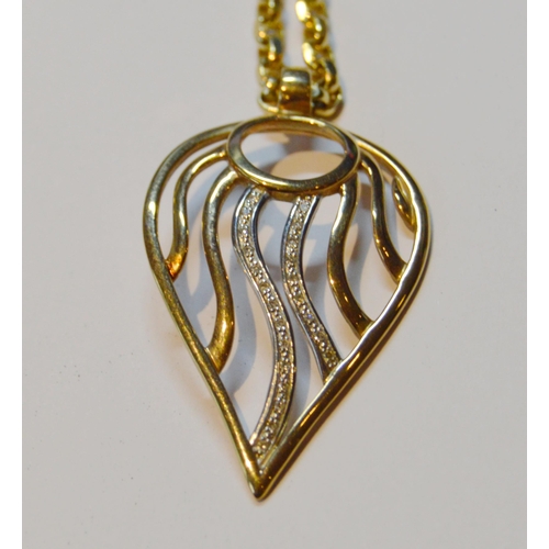 139 - 9ct gold pendant of drop form with tiny diamonds, with 9ct gold necklet, gross 15.4g gross.