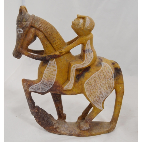 307 - Three carved soapstone Mbigou stone sculptures, origin Gabon, Africa, modelled as riders on horsebac... 