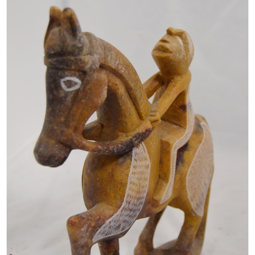 307 - Three carved soapstone Mbigou stone sculptures, origin Gabon, Africa, modelled as riders on horsebac... 