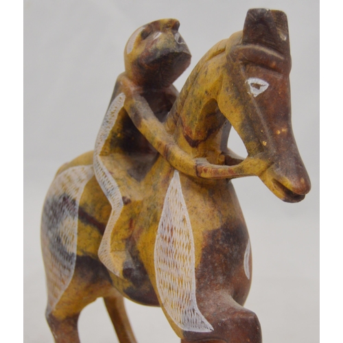 307 - Three carved soapstone Mbigou stone sculptures, origin Gabon, Africa, modelled as riders on horsebac... 