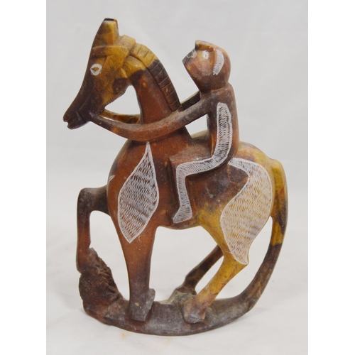 307 - Three carved soapstone Mbigou stone sculptures, origin Gabon, Africa, modelled as riders on horsebac... 