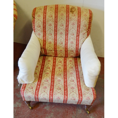 457 - Howard & Sons of LondonNear-pair of walnut armchairs, c. early 20th century, upholstered in peri... 