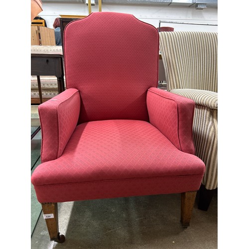 601 - Upholstered red armchair