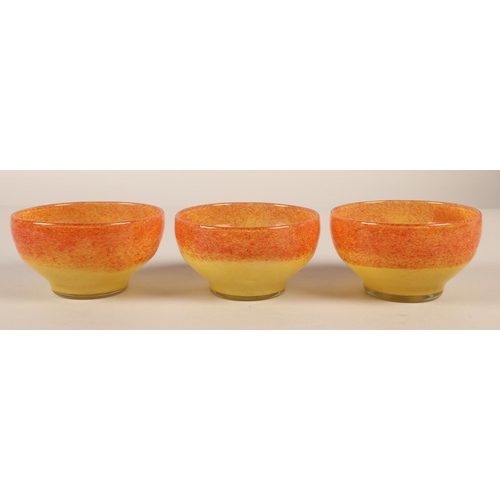 219 - Three Vasart orange and yellow glass bowls, signed to base