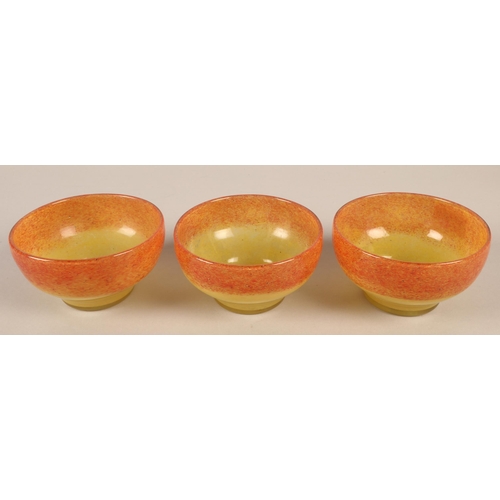 219 - Three Vasart orange and yellow glass bowls, signed to base