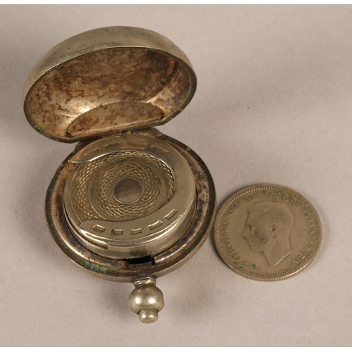 234 - White metal hand mirror and silver brush, and white metal sixpence holder