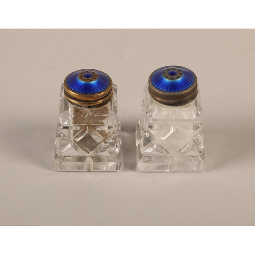 235 - Cased set of two Norwegian cut glass salt and pepper pots with blue enamelled silver tops 