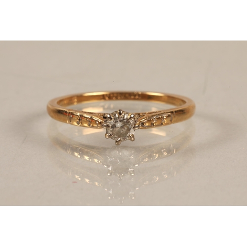 53 - 18ct gold and platinum band set with diamond solitaire, ring size M, gross weight 1.9g