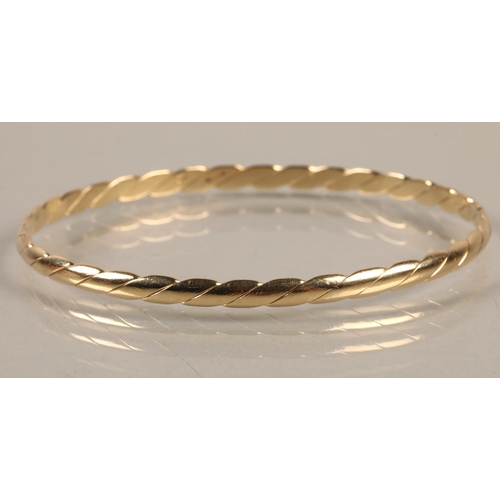 57 - 9ct gold rope twist bangle, 10g