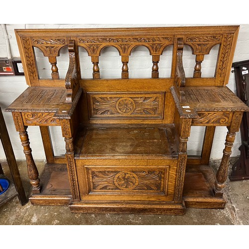 578 - Modified carved oak hall bench, H 116cm, W 141cm, D 45cm