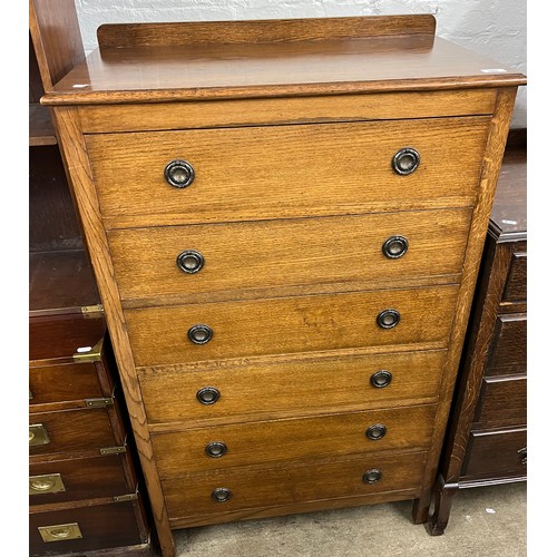 596 - Oak six-drawer chest, 123cm high