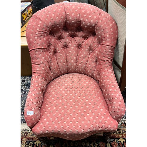 628 - Button back armchair in red floral upholstery