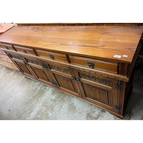 608 - Oak sideboard with carved foliage design, H 86.5cm, W 187cm, D 44cm