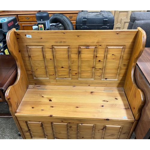 646 - Pine hall bench with storage compartment, H 99cm, W 97cm, D 39cm