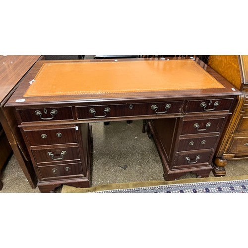 648 - Leather topped writing desk, H 77cm, W 121cm, D 60cm