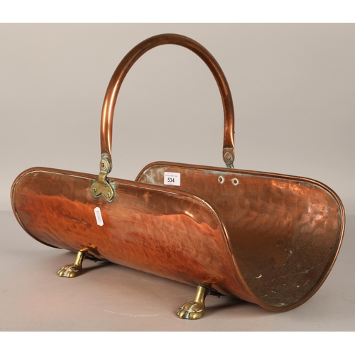 534 - Copper log basket with paw feet