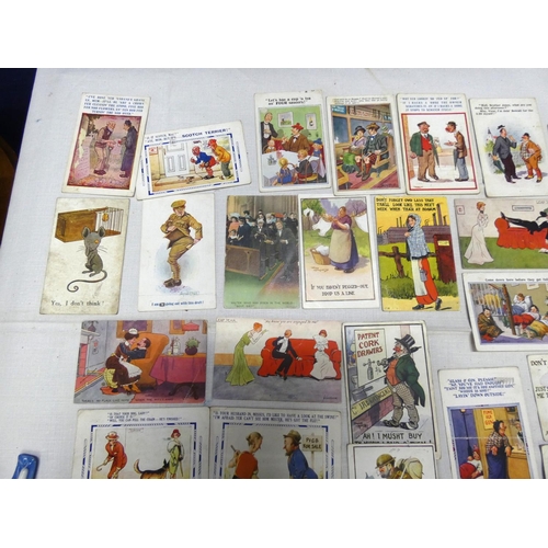 274 - Large collection of novelty postcards to include Donald McGill.